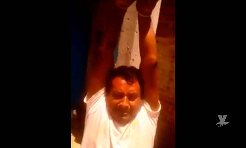 (VIDEO) Síndico detenido por habitantes pide ayuda al Gobernador para no ser quemado vivo