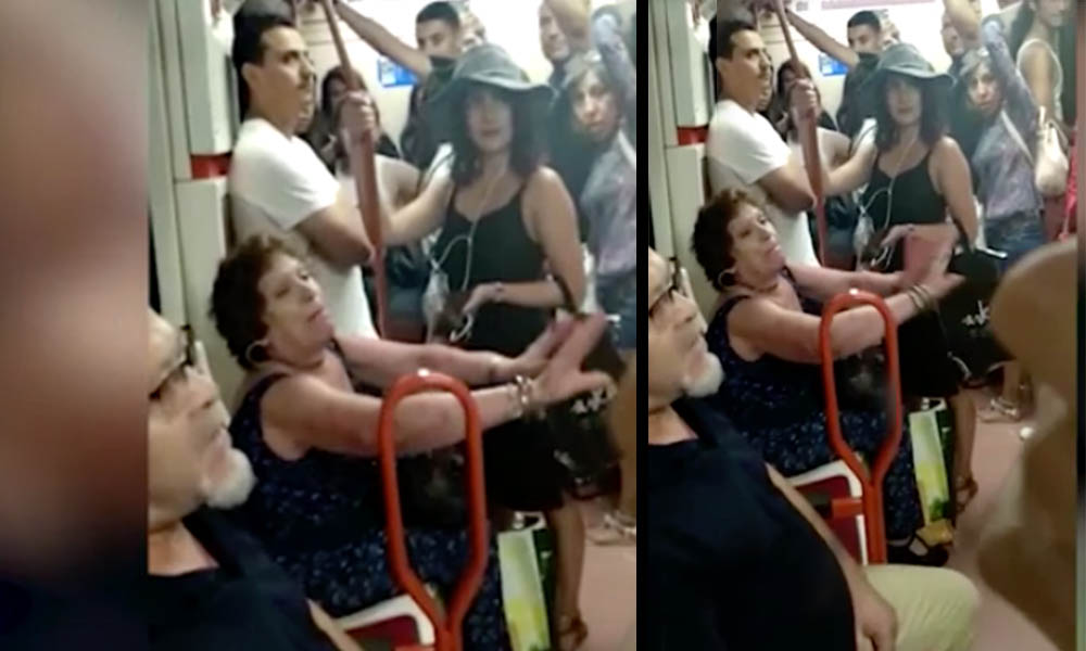 Indignante; mujer niega asiento en el metro a una niña latina (VIDEO)