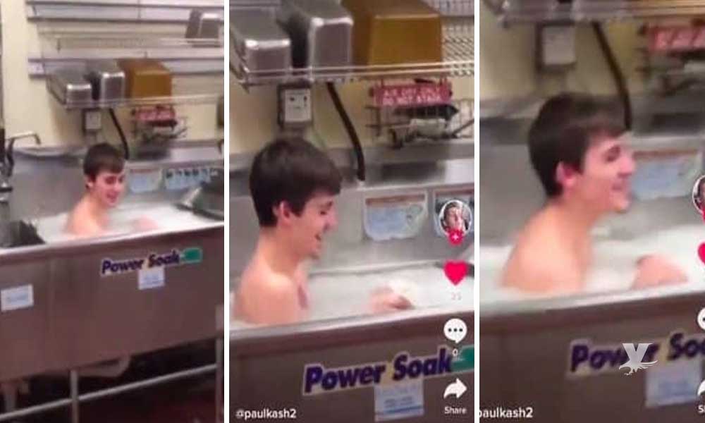 (VIDEO) Empleado de restaurante se baña en la cocina mientras prepara comida